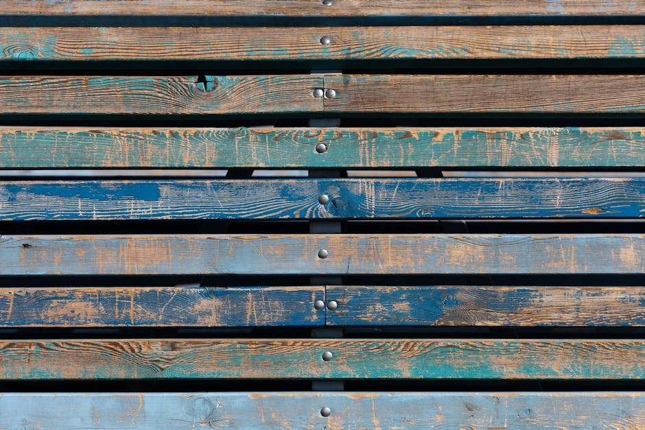Adelaide retaining wall comparison showing concrete sleeper and timber side by side
